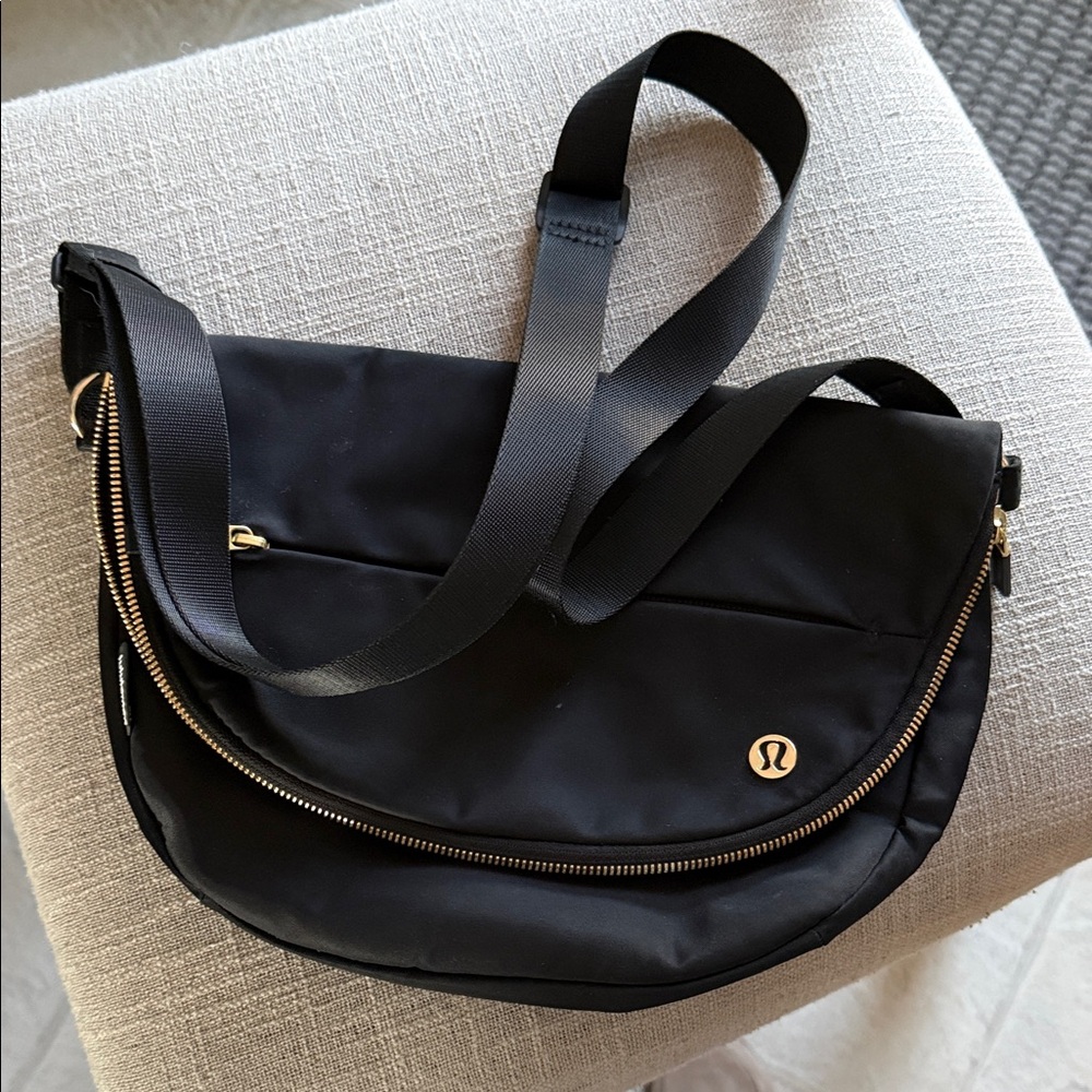 Lululemon athletica Black Crossbody Bag with Gold Accents